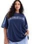 Фото #1 товара ASOS DESIGN Curve oversized t-shirt with spray effect california graphic in navy