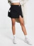 JDY exclusive notch front mini skirt in black