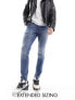 Фото #1 товара ASOS DESIGN skinny jeans with abrasions in mid wash blue