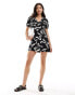 Фото #1 товара Wednesday's Girl v-neck short sleeve mini dress in black and white swirl