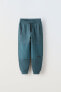 Фото #1 товара Комбинированные брюки из мягкой ткани ZARA