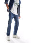 Фото #1 товара Levi's 555 '96 relaxed straight fit jeans in mid blue