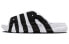 Фото #1 товара Сланцы спортивные Nike Air More Uptempo Slide, бело-черные, мужские/женские, арт. FB7818-100