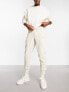 Puma essentials small logo joggers in off white