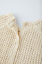 Cable-knit sweater