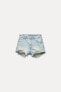 TRF CURVED HIGH-WAIST RIPPED DENIM SHORTS