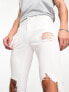 Фото #5 товара ASOS DESIGN spray on jeans with power stretch with heavy rips in white