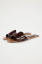 Flat criss-cross leather slider sandals
