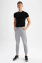 Фото #7 товара Спортивные брюки Defacto Slim Fit с карманами и манжетами