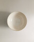 Raised stoneware bowl