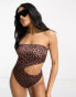 ASOS DESIGN bandeau cut out swimsuit in tortoise shell print