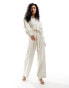 Фото #1 товара & Other Stories long sleeve jumpsuit with button front and tie waist in light beige