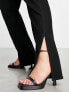 Фото #4 товара ASOS DESIGN Curve slim straight jeans with split hem in black