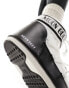 Moon Boot mid ankle snow boots in black and white