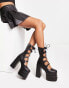 Lamoda platform shoe with high leg fastening in black pu