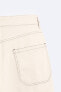 Trousers with contrast topstitching