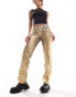 Monki Moop low rise straight leg jeans in blue wash with gold foil