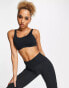 Фото #2 товара Nike Training Alate Coverage Dri-FIT light support sports bra in black