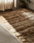 Golden viscose rug