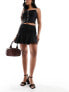 Extro & Vert flippy mini skirt in black