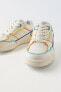 Minimalist lace-up sneakers with multicoloured trim