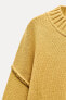 KNIT SWEATER WITH VISIBLE SEAMS