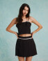 Фото #2 товара Miss Selfridge pleated mini skirt with bow detail co ord in black