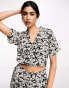 ASOS DESIGN 2 in 1 shirt jumpsuit in ditsy floral