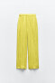 Creased-effect palazzo trousers