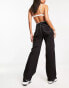 DTT Blaze wide leg cargo jeans with chain in black