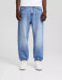 Bershka loose fit jeans in mid washed blue