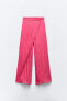 Creased-effect wrap trousers