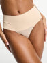 Spanx Undie-tectable thong in beige