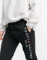 Tommy Hilfiger embroidered logo cuffed joggers in black