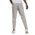 Фото #4 товара Adidas Essentials Colorblock Block Cut 3-Stripes Regular Tapered Pants W HB2768