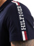 Tommy Hilfiger global stripe monotype regular polo shirt in Navy