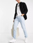 Фото #1 товара Levi's 512 slim taper fit jeans in light blue wash with knee rip