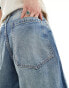 Bershka super baggy jeans in washed mid blue