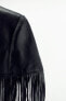 Short leather cape with fringing