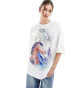 Monki relaxed t-shirt in white with horses front print