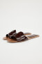 Flat criss-cross leather slider sandals