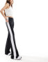 Фото #8 товара ASOS DESIGN contrast seam kick flare trouser in black