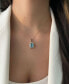 ფოტო #4 პროდუქტის Blue Topaz (3-1/2 ct. t.w.) & Diamond (1/2 ct. t.w.) Adjustable 20" Pendant Necklace in 14k Rose Gold