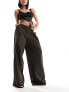 Фото #1 товара NA-KD x Claire Rose pleat detail trousers in brown