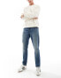 Фото #1 товара ASOS DESIGN slim jeans in mid wash blue with tint