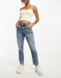 ASOS DESIGN Petite slim mom jeans in mid blue with rip