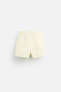 BUTTONED SHORT SWIMMING TRUNKS