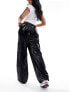 Фото #3 товара Rains Cargo lightweight waterproof wide leg trousers in shiny black