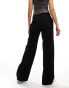 Weekday Emily low waist trousers in black