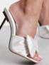 Glamorous bow heeled sandals in white